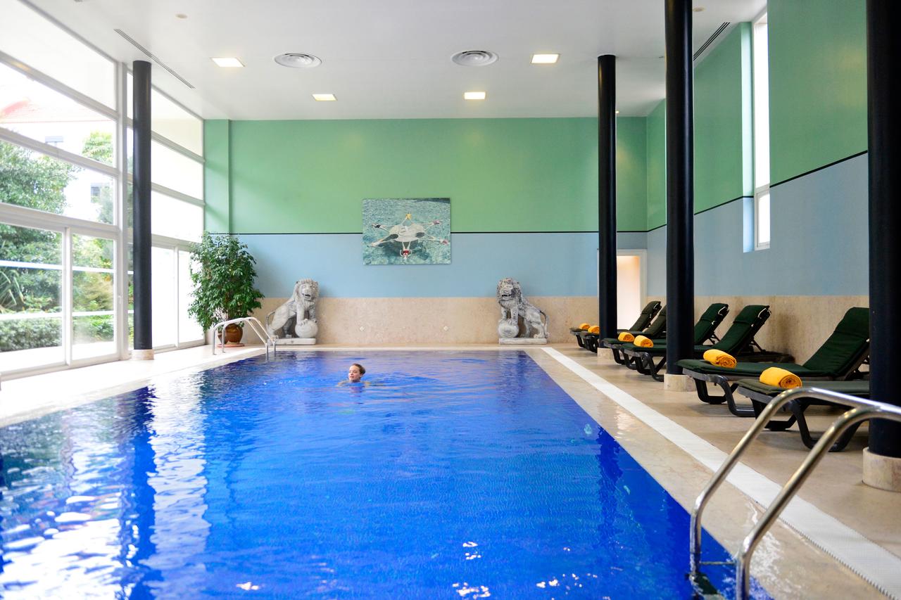 The swimming pool at or near Pestana Palace Lisboa Hotel & National Monument - The Leading Hotels of the World 